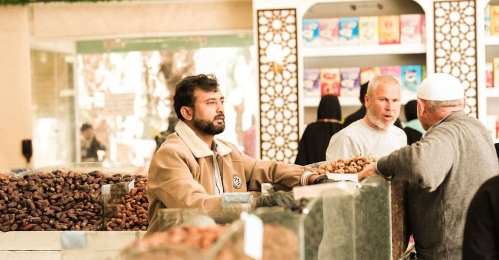 Vibrant scene of a traditional date market in Saudi Arabia with diverse people engaging.
